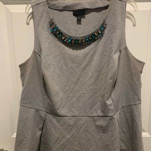 Sleeveless peplum shirt